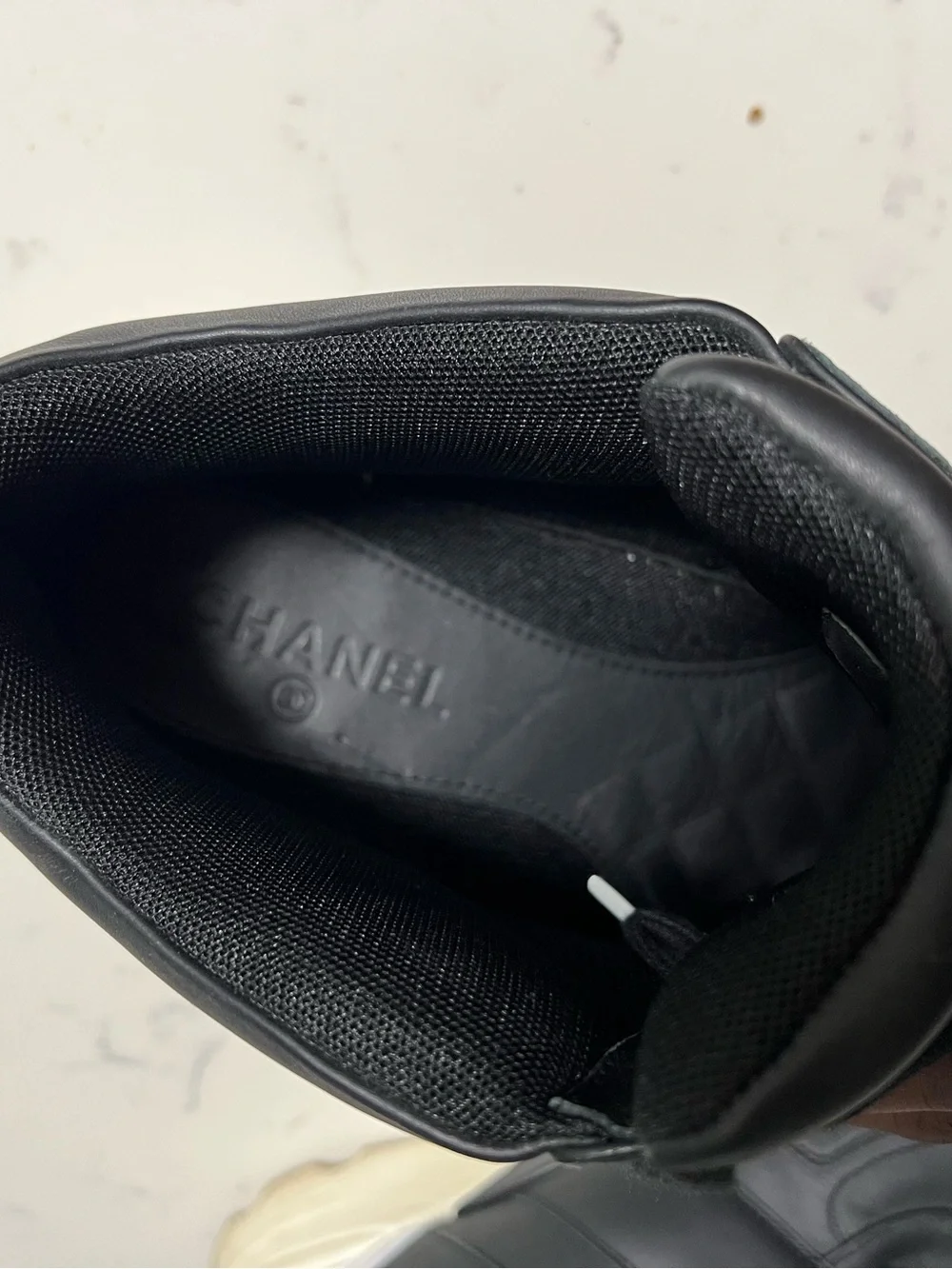 CHANEL Black Men's High-Top Leather Sneakers with Logo Tab